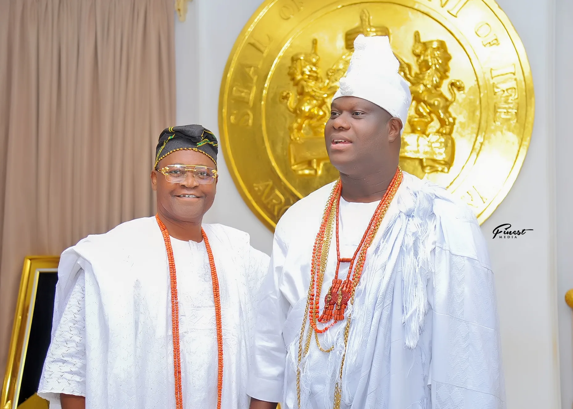 His Royal Majesty in purple and gold royal attire